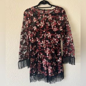 Floral Lace Romper with attached cover underneath. Fits size 8 or 10